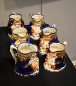 Six various copper lustre and coloured Toby jugs