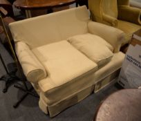 A modern two seat sofa, with removable cushions and covers, 137cm wide overall