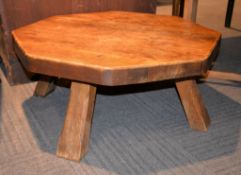 An elm and oak octagonal coffee table, of recent manufacture, 41cm high, 95cm wide