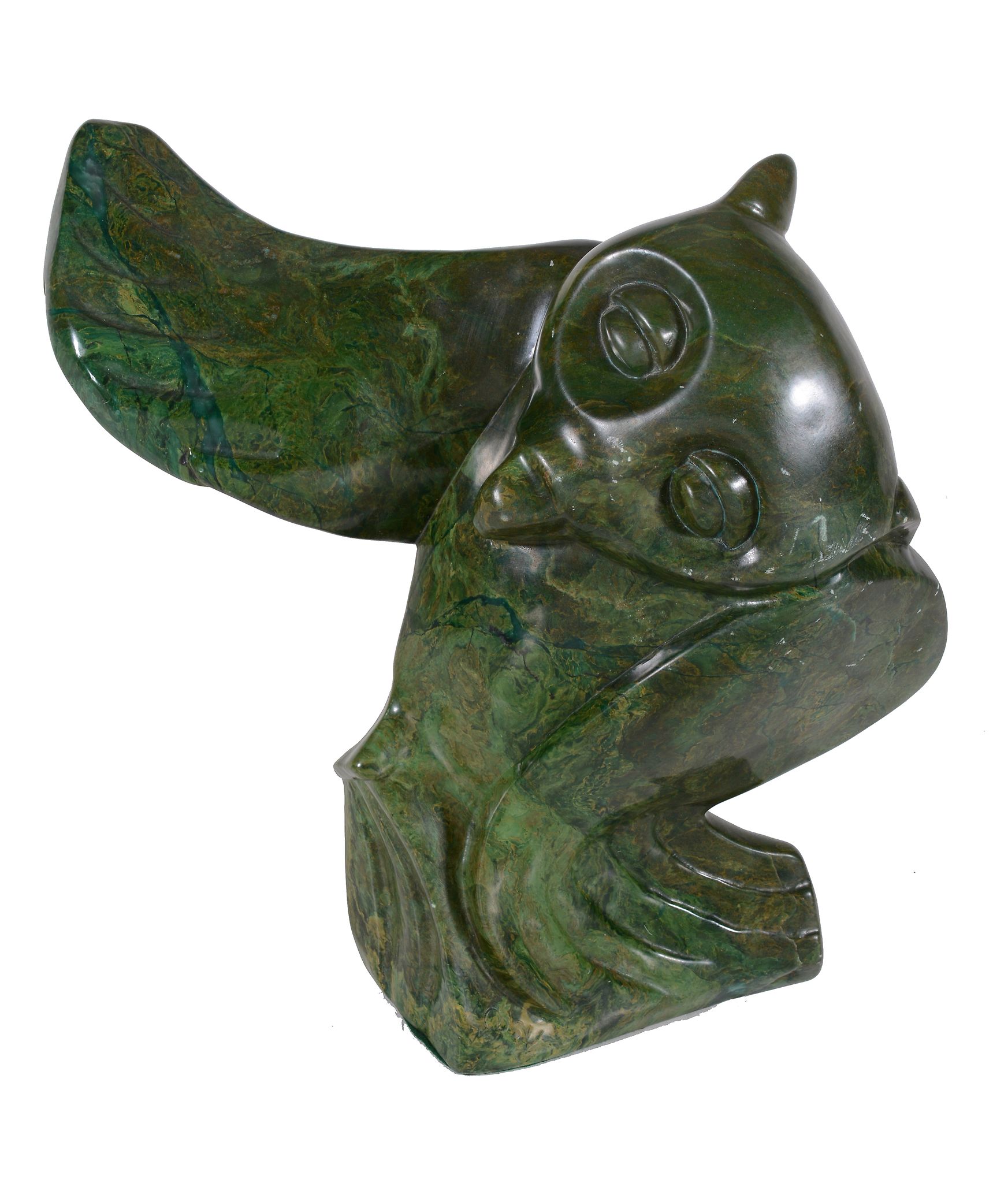 A Zimbabwean hardstone sculpture of an owl, with one wing raised, unsigned, 29cm high
