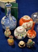 A 19th century Chinese blue and white bottle shaped vase and stopper, a green glazed pillow and