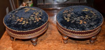A pair of Victorian walnut footstools, one stamped Wylie & Lockhead, Glasgow to underside, each 29cm