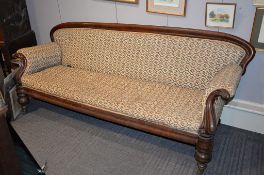 A mid Victorian walnut showframe sofa , circa 1860 of large proportion, 92cm high, 235cm wide,