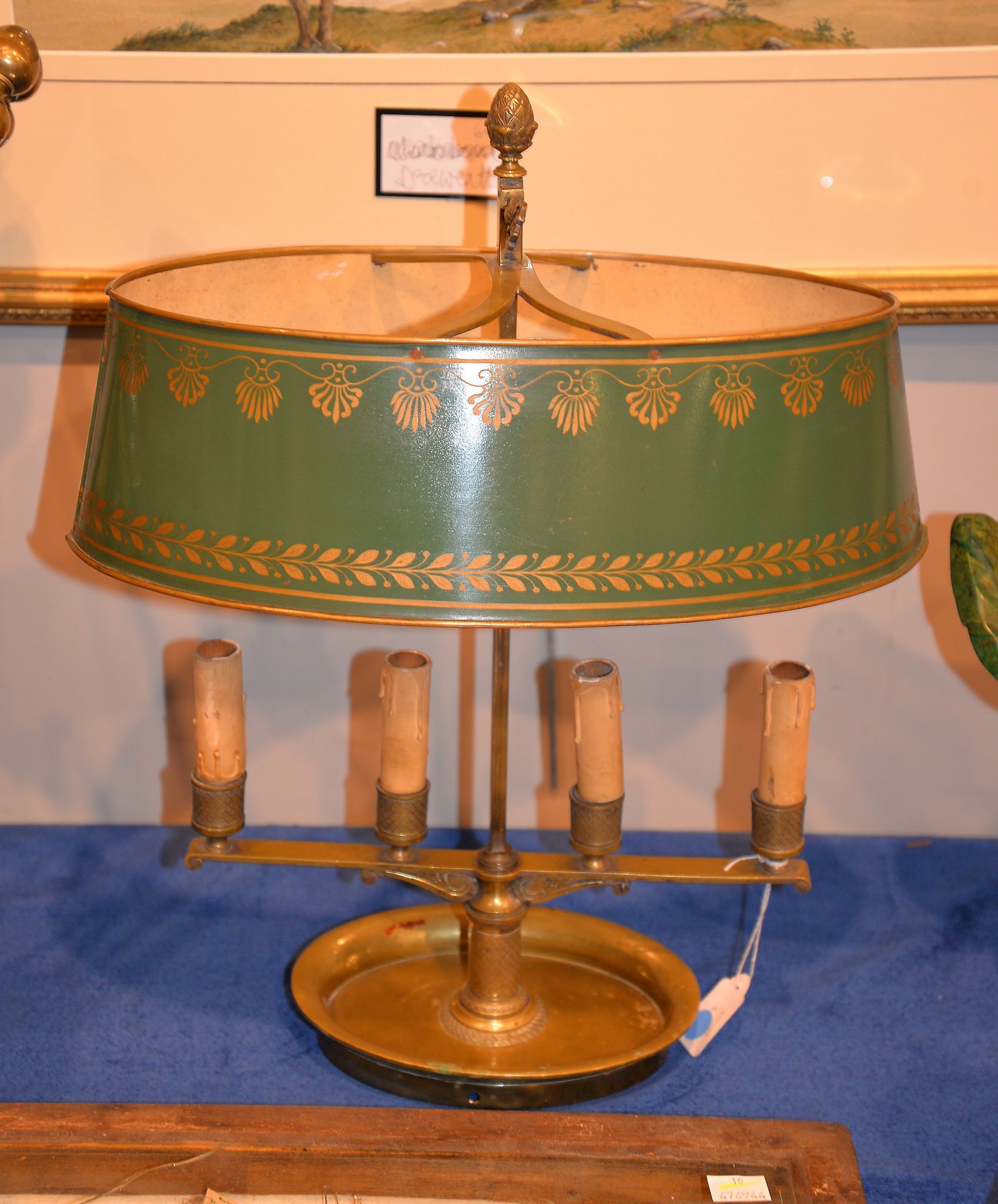 A bouilloute lamp, with toleware shade above four sconces, fitted for electricity, 52cm high