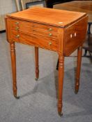 A mahogany drop-leaf work table, early 19th century, 78cm high, 52cm wide (un-extended)