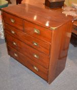 A hardwood and brass bound chest of drawers in Victorian style, of recent manufacture, with two