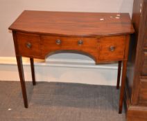 A mahogany and line inlaid dressing table, 75cm high, 91cm wide, and associated toilet mirror