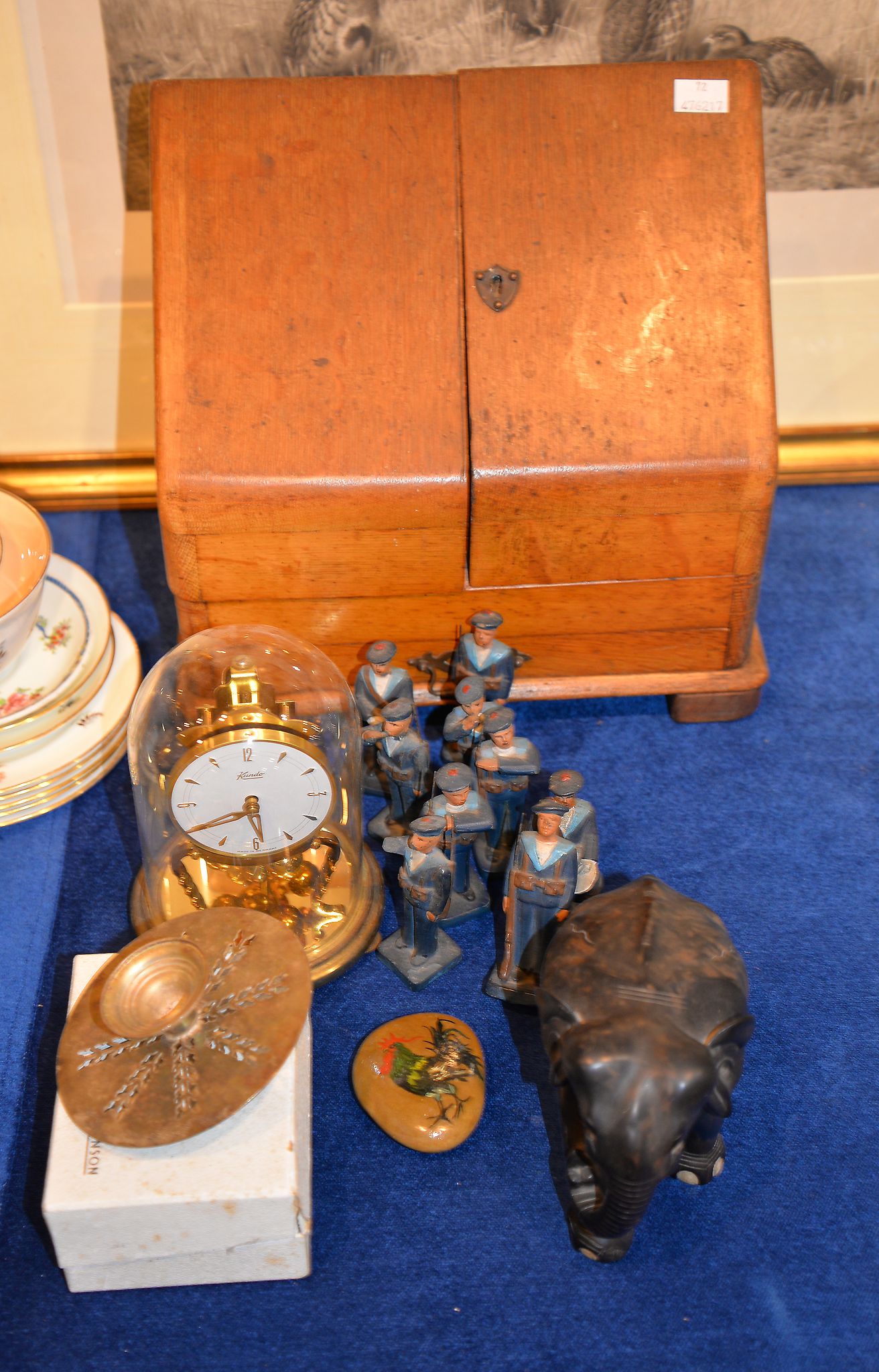 A set of nine early 20th century carved and painted wood figures of soldiers, and other items