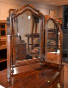 A walnut triptych folding dressing mirror, circa 1930, 69cm high