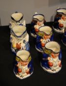 Six various Toby jugs , including two in 'willow pattern' and four copper lustre enriched examples