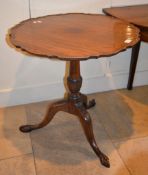 A mahogany piecrust table in George III style, 72cm high, 71cm diameter