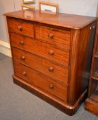 A late Victorian mahogany chest of two short and three long drawers, 113cm high, 117cm wide, 52cm