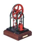 A well engineered model of the live steam over crank stationary engine Georgina , built to the