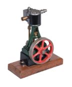 A model of a Stuart Turner 10V vertical steam engine, having metal clad cylinder supported on trunk