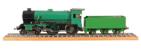 A model of a 2 1/2 inch gauge live steam 4-4-0 tender locomotive, the boiler with fittings