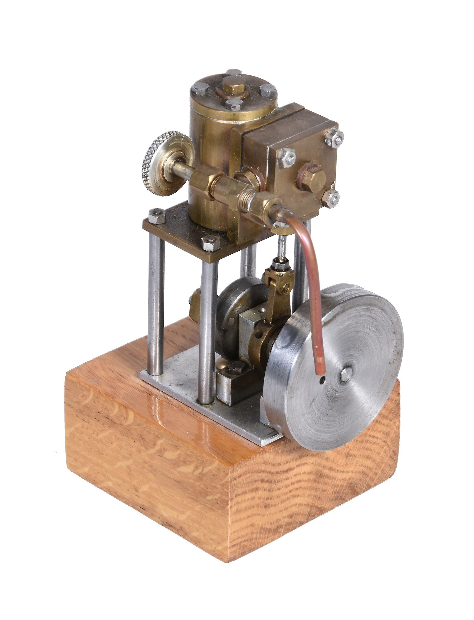 A live steam vertical engine, the single cylinder supported on four pillars with disc crank,
