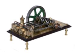 A well engineered model of a horizontal twin cylinder live steam mill engine, set on polished brass
