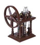 A well engineered model of a Tuxford Double side rod central cylinder live steam stationary engine,