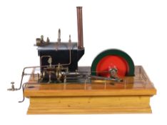 A model of a horizontal live steam mill engine, having single cylinder clad with wood and fitted