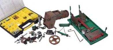 A dismantled model of a Freelance traction engine, metal boiler, sundry parts. Model incomplete.