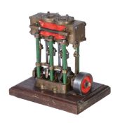 A well engineered model of a live steam vertical twin simple marine launch engine, the open crank