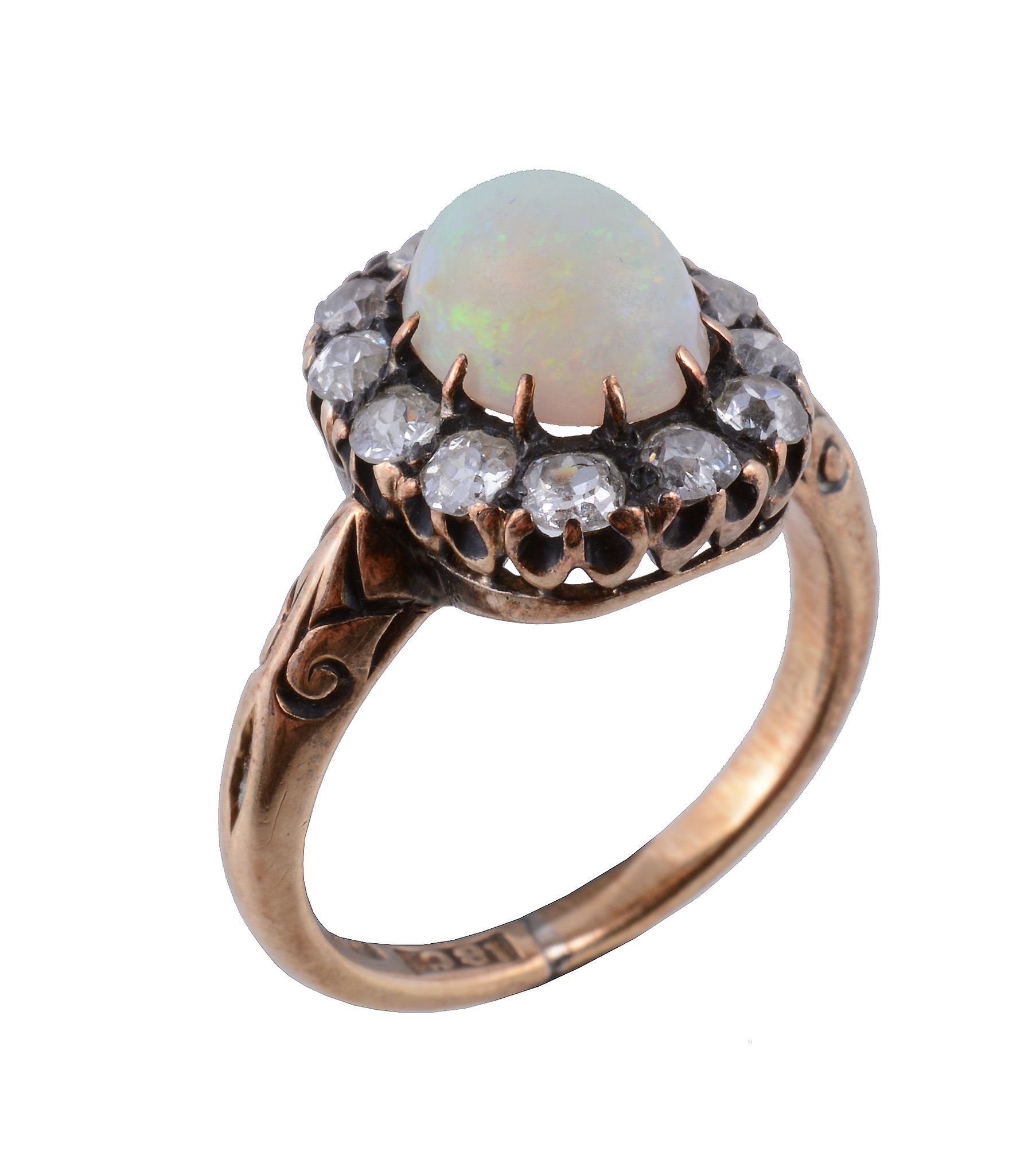 A diamond and opal cluster ring , the central oval cabochon opal within a surround of old brilliant