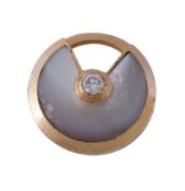An diamond and mother of pearl Amulette de Cartier by Cartier , the circular charm with a mother of