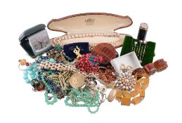 A collection of costume jewellery , to include various brooches; necklaces; a travel clock; and