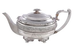 Ω A George III silver oblong baluster tea pot by Samuel Hennell, London 1818, with an oblong finial