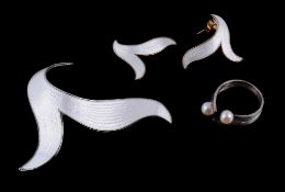 A white enamel brooch by Finn Jensen, Oslo, Norway, circa 1960, the curved foliate white enamelled