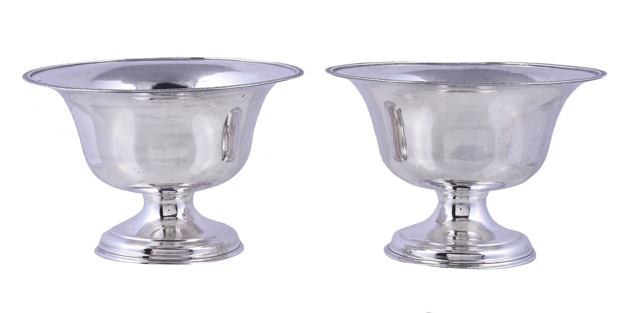 A pair of Norwegian silver coloured circular pedestal bowls by T. Olsen, .830 standard, with