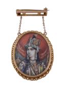 A 19th century miniature brooch/pendant, the oval panel painted with a bejewelled female, possibly