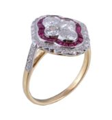 A diamond and ruby panel ring, centred with a quatrefoil of brilliant cut diamonds within a