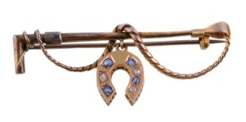 An Edwardian sapphire and diamond equestrian interest bar brooch , the bar in the form of a hunting