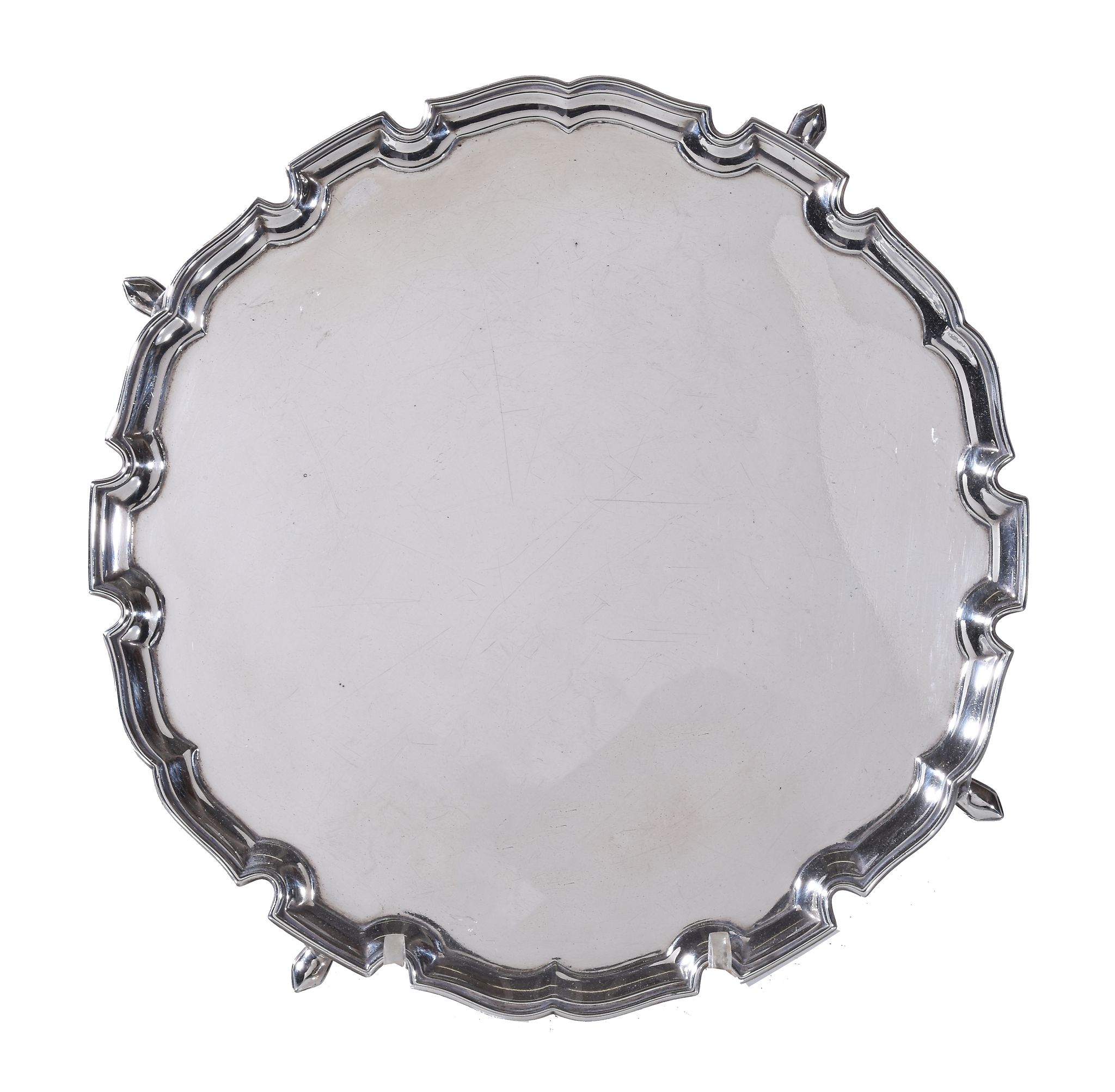 A silver shaped circular salver by Jay, Richard Attenborough Co. Ltd., London 1930, with a raised