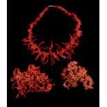 Ω A branch coral necklace ; together with two further branch coral necklaces; and further strung