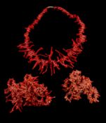 Ω A branch coral necklace ; together with two further branch coral necklaces; and further strung
