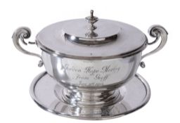 A silver porringer, cover and stand by Sebastian Garrard, London 1910, with a compressed finial and