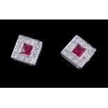 A pair of diamond and ruby square cluster ear studs , each stud centred with a step cut ruby within