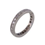 A diamond eternity ring, set with eight cut diamonds, approximately 0.37 carats total, finger size