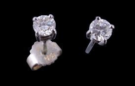A pair of diamond ear studs, the brilliant cut diamonds, approximately 0.32 carats total, with post