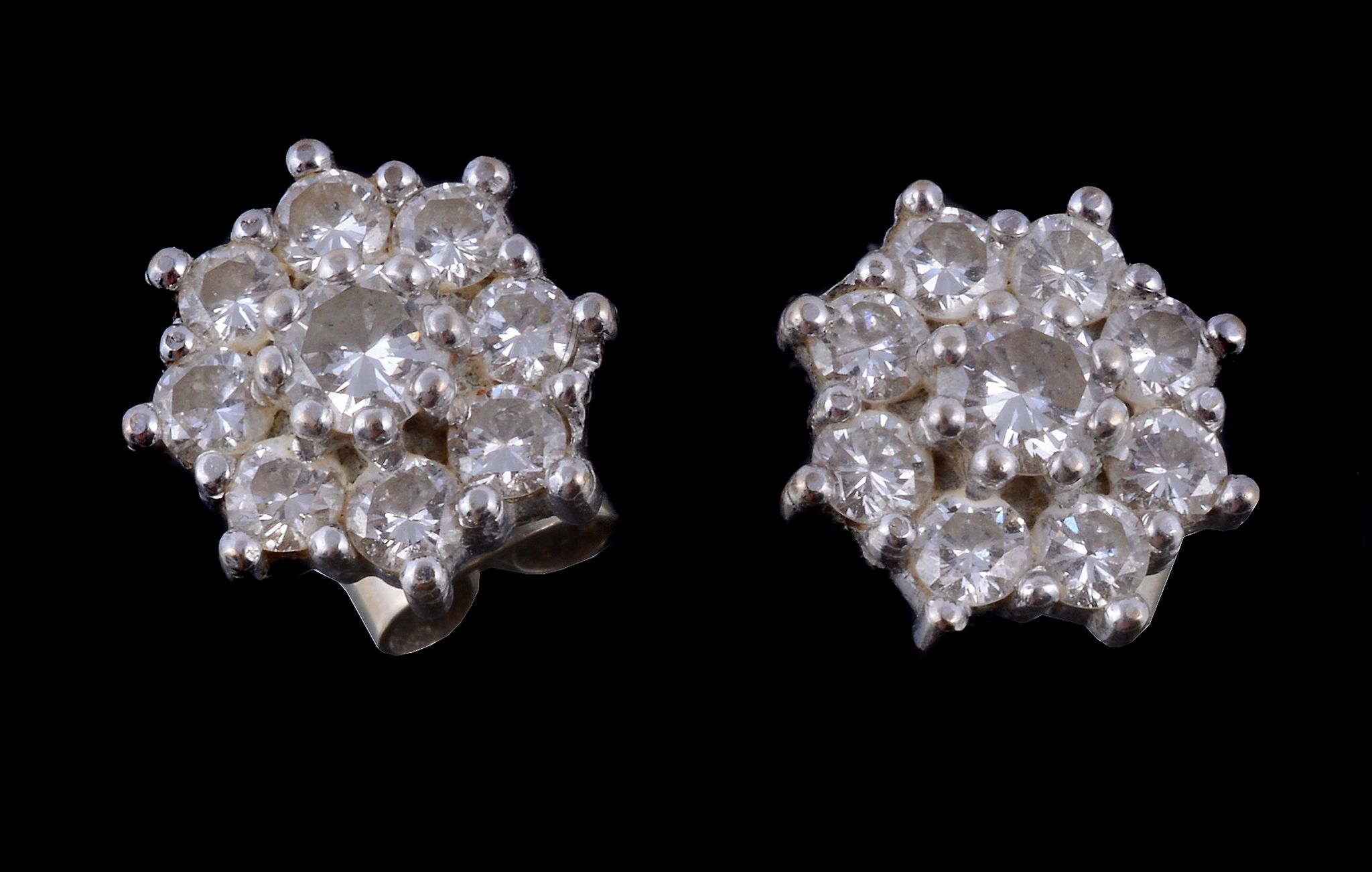 A pair of 18 carat gold diamond cluster ear studs, set with brilliant cut diamonds approximately 1.