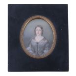 Ω English Provincial School, circa 1840 Portrait of a young lady dressed in mourning Watercolour on