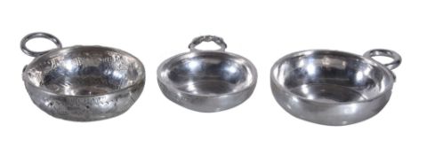 Three silver wine tasters (taste vins) with serpent handles, comprising a French 1st standard