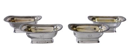 A set of four George III Scottish silver oblong salt cellars, maker's mark obscured, Edinburgh