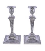 A pair of late Victorian silver neo-classical candlesticks by Thomas Bradbury & Sons, London 1898,