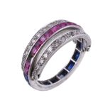 A diamond, ruby and sapphire night and day ring, the swivel panels set with eight cut diamonds and