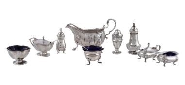 A George III Irish silver shaped oval sauce boat, maker's mark obscured, Dublin 1782, with a leaf