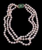 A three strand cultured pearl necklace, the graduated strands composed of cultured pearls on a