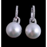 A pair of South Sea cultured pearl and diamond earrings, the 1.4cm South Sea cultured pearls set